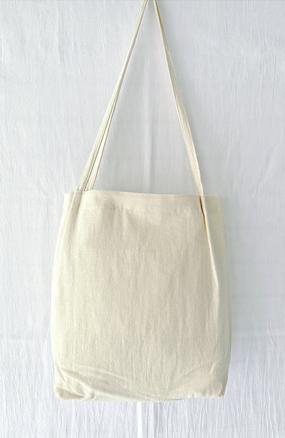 Natural cotton linen bag with floral embroidery, a unique gift for loved ones
