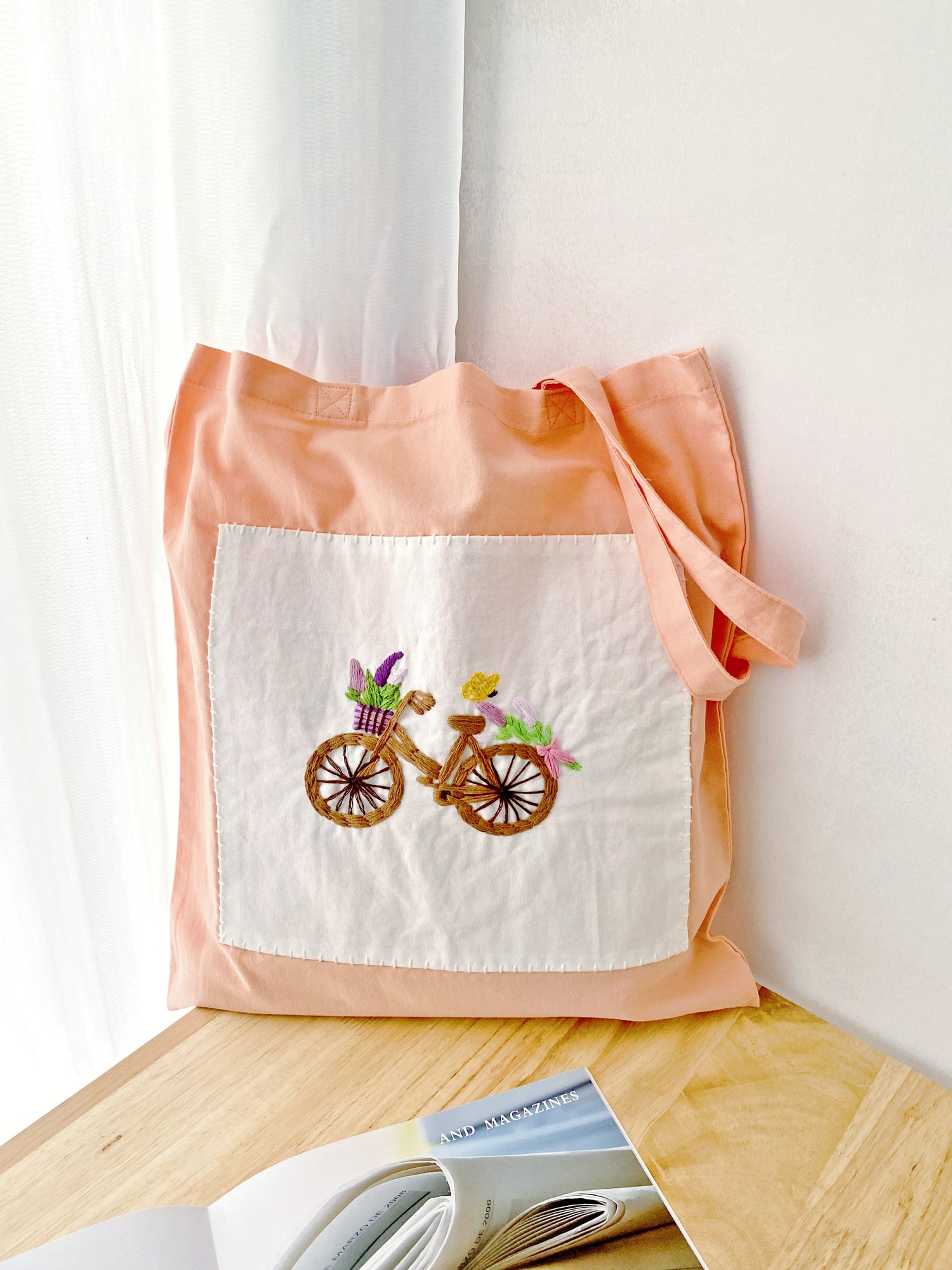 orange cotton shopping tote bag with embroidery for gift-givers