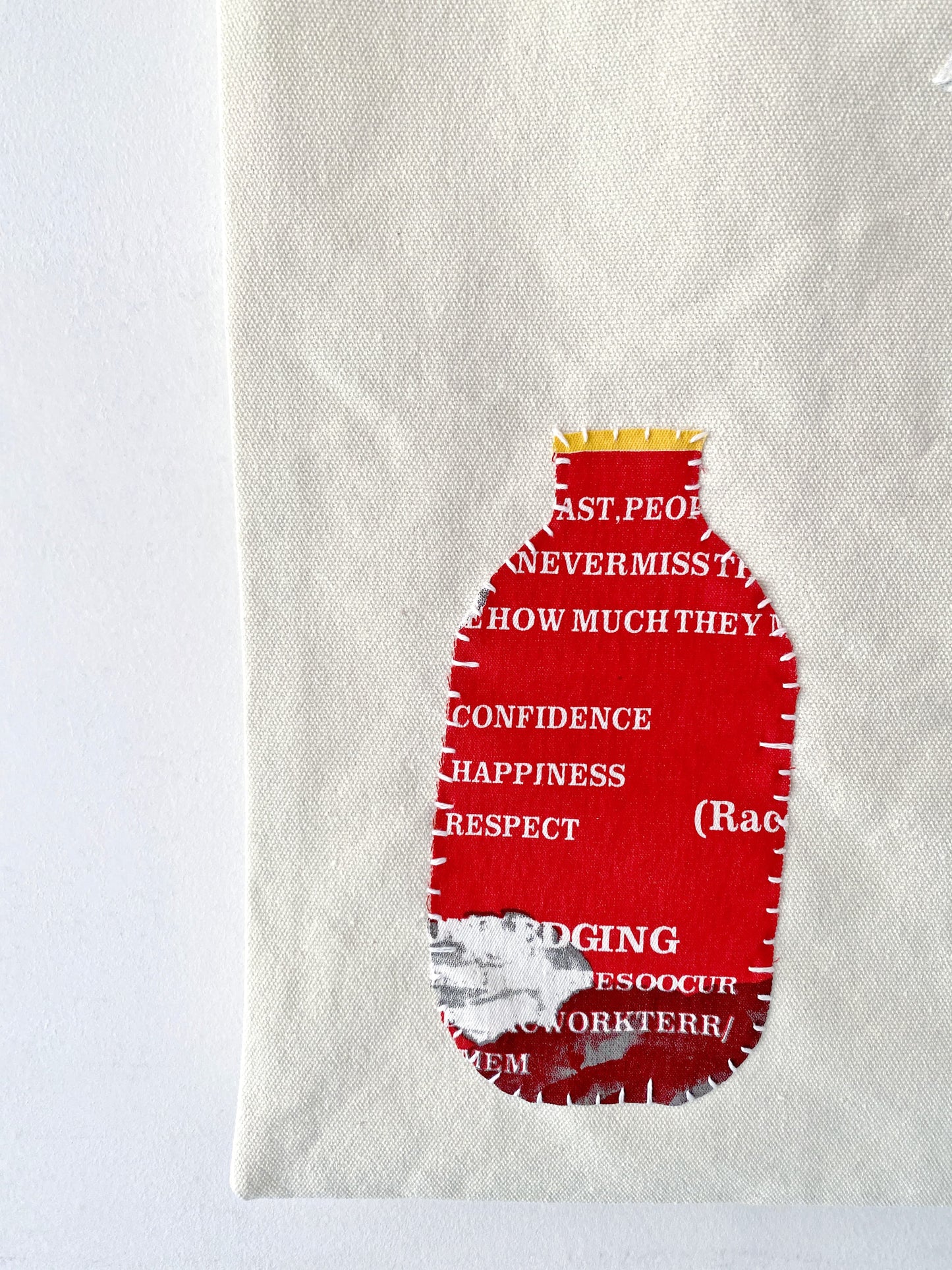 Artistic tote bag displayed with a casual linen outfit for slow living vibes.