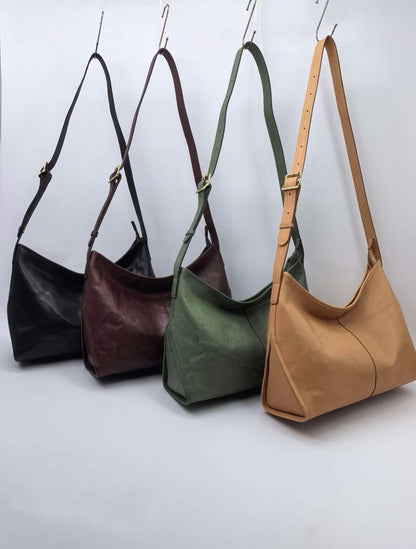 Washed leather shoulder bag with natural creases for casual city walks