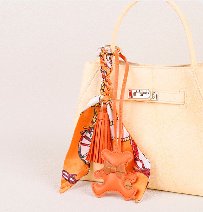 Handmade teddy bear keychain with silky scarf detail for everyday handbags