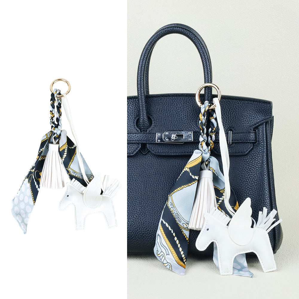 Artisanal faux leather bag ornament with decorative scarf detail for women gifts