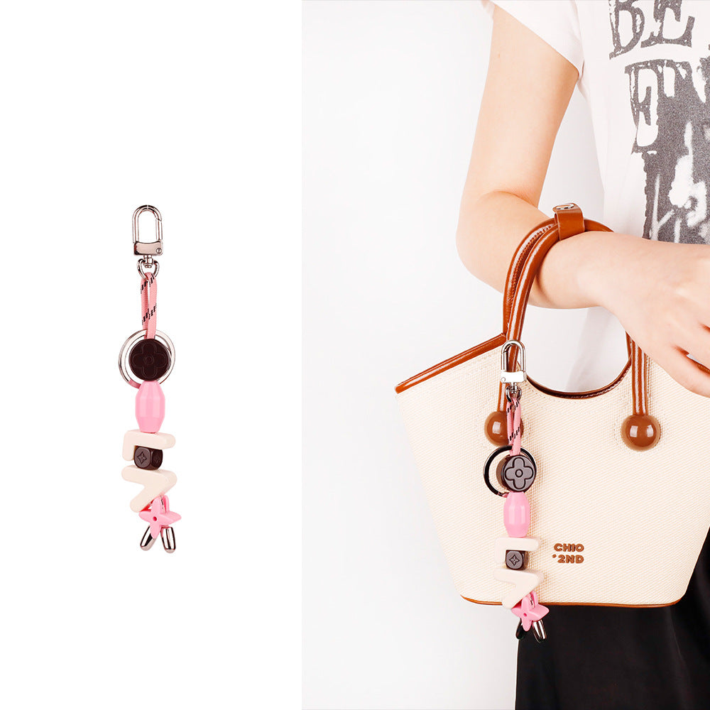 Aesthetic alphabet keychain on mini top handle bag