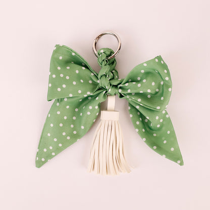 Handmade fashion charm with a bow