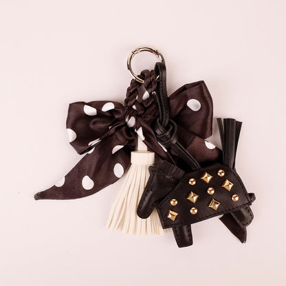 Retro animal charm with a soft fabric bow