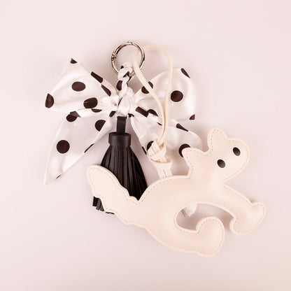 Handmade handbag decoration with tassel detail