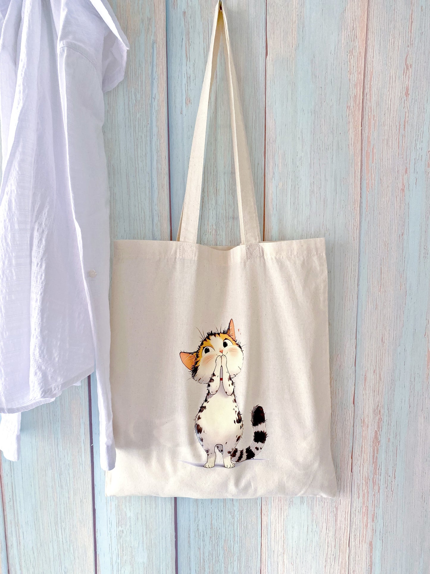 Thoughtful eco friendly gift tote with a hand printed kitty design for cat lovers