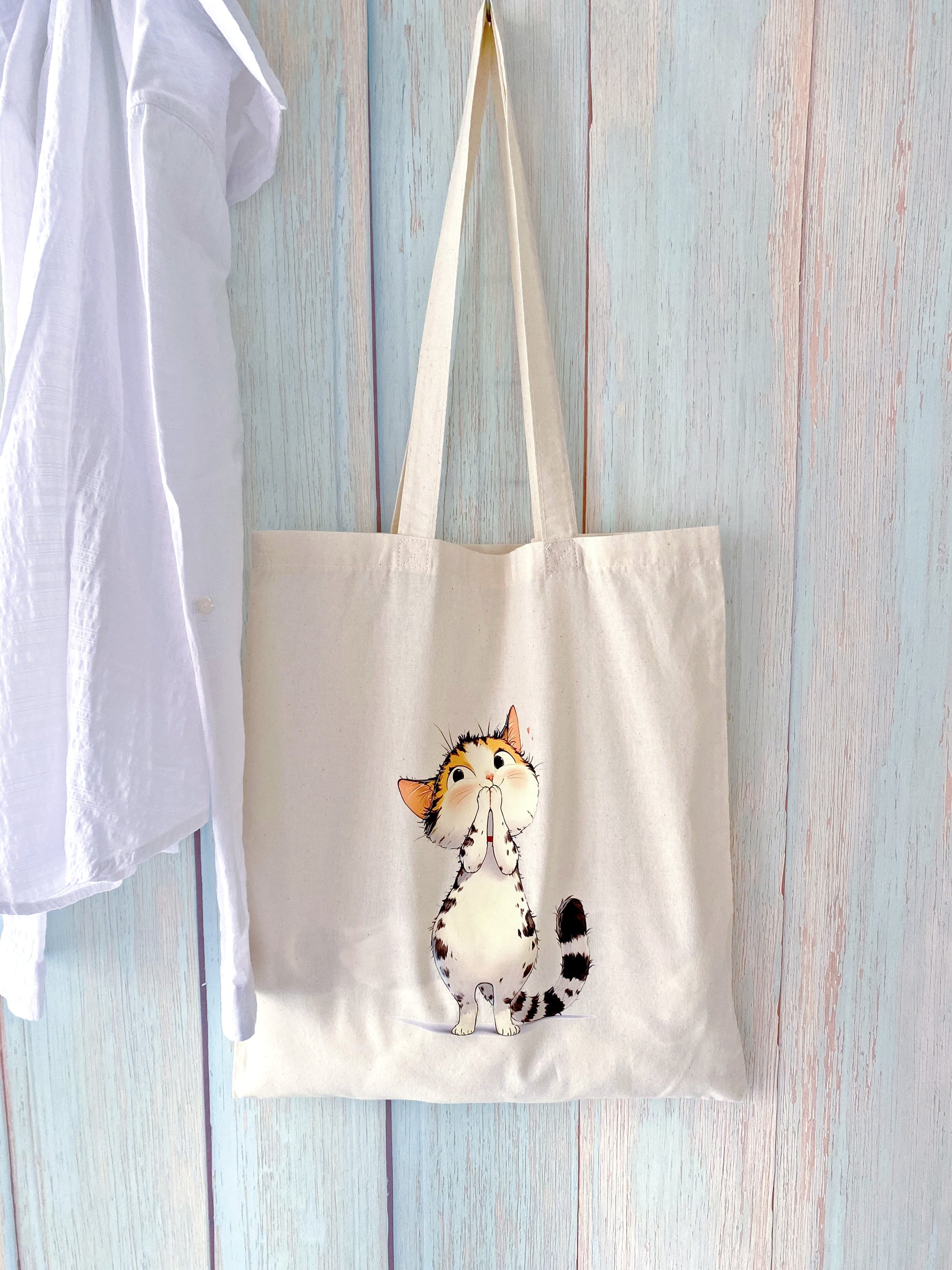 Thoughtful eco friendly gift tote with a hand printed kitty design for cat lovers