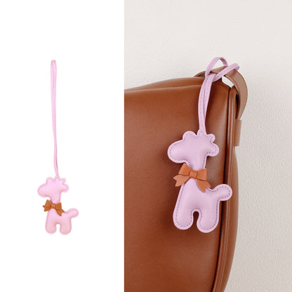Playful scarf detail on a decorative purse charm