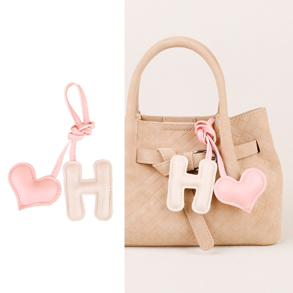 Little alphabet charm adding detail to a bag