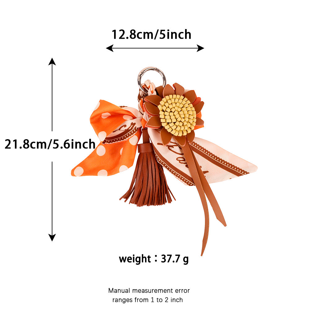 Decorative orange tassel charm for everyday handbags
