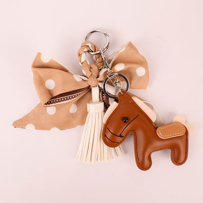 French-inspired khaki accessory for a classic handbag