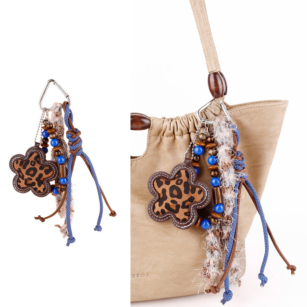 Natural material bag charm with a distinctive handmade look