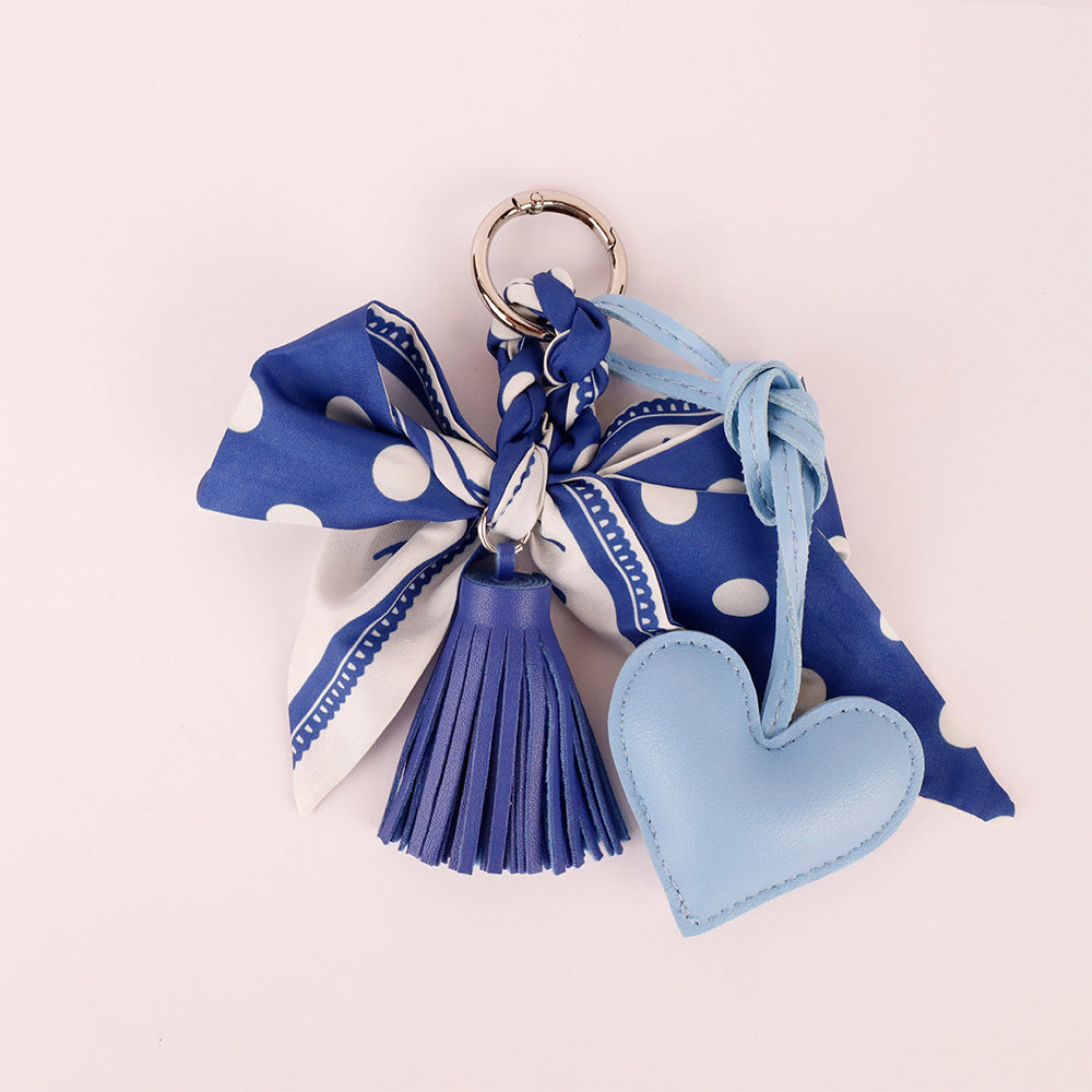 Navy scarf bow accessory for personalizing bags