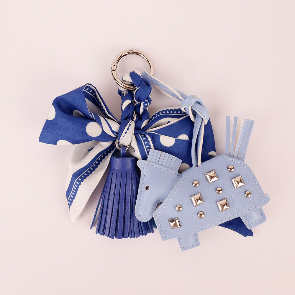 Fabric bow charm with tassel for handbags