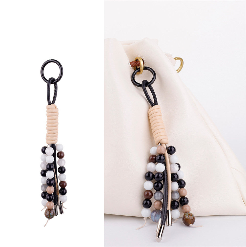 Colorful natural mineral beads strung together for a unique aesthetic phone wrist strap