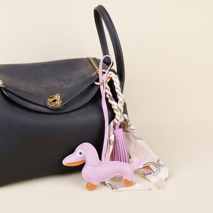 Handmade leather dachshund bag charm as a unique gift for pet lovers