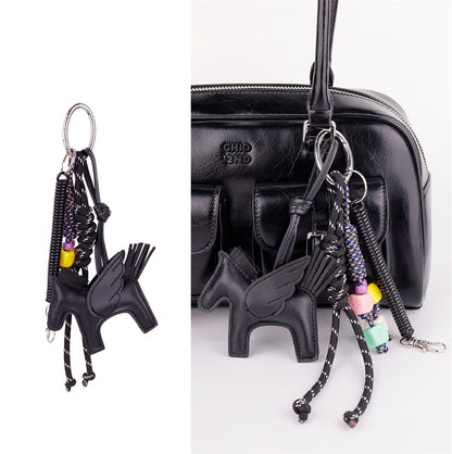 Multi color pony bag decoration adding contrast to leather