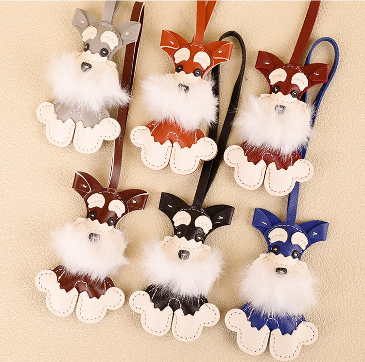 Handmade dog keychain with a festive Christmas Schnauzer puppy