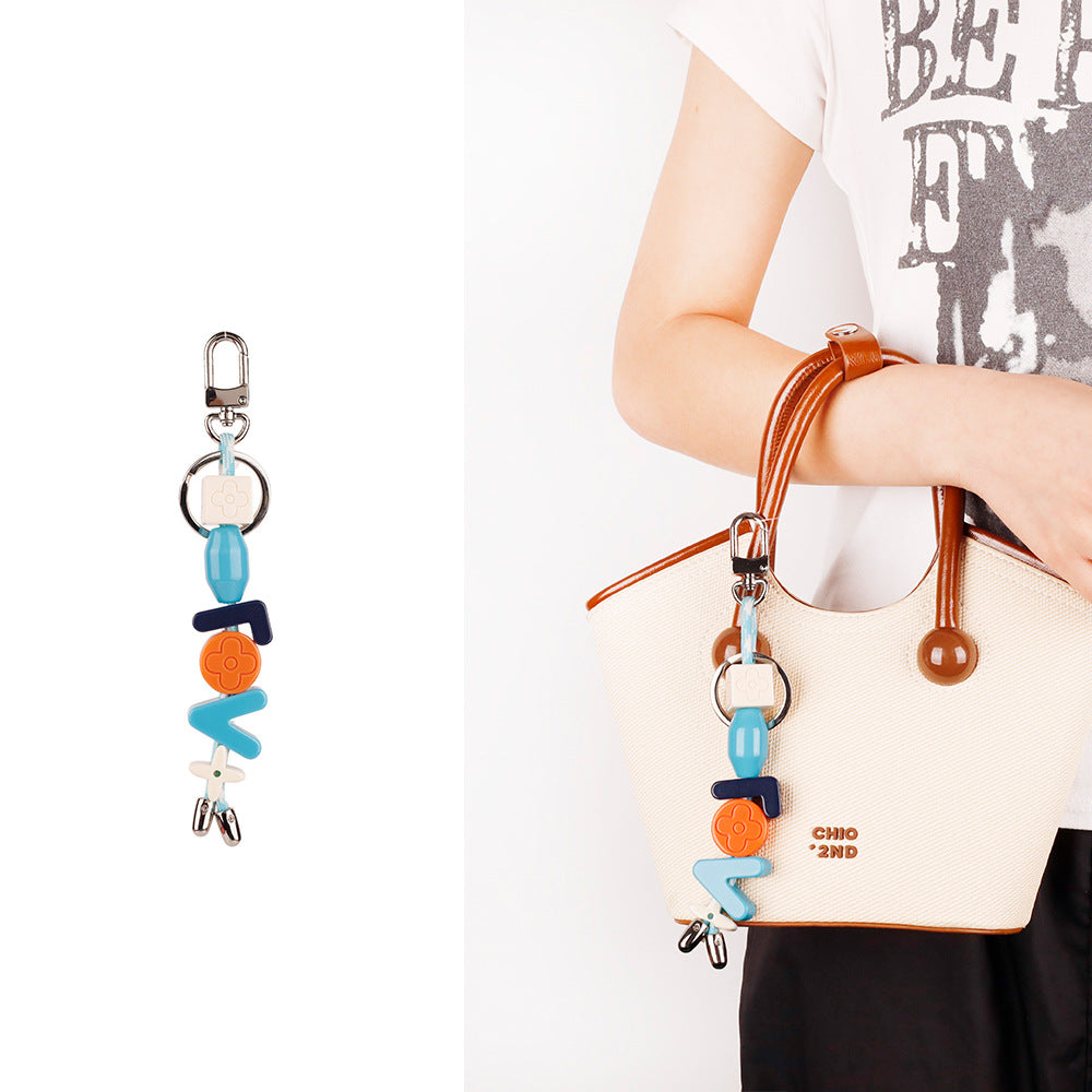 Colorful wristlet charm for smartphone case accent