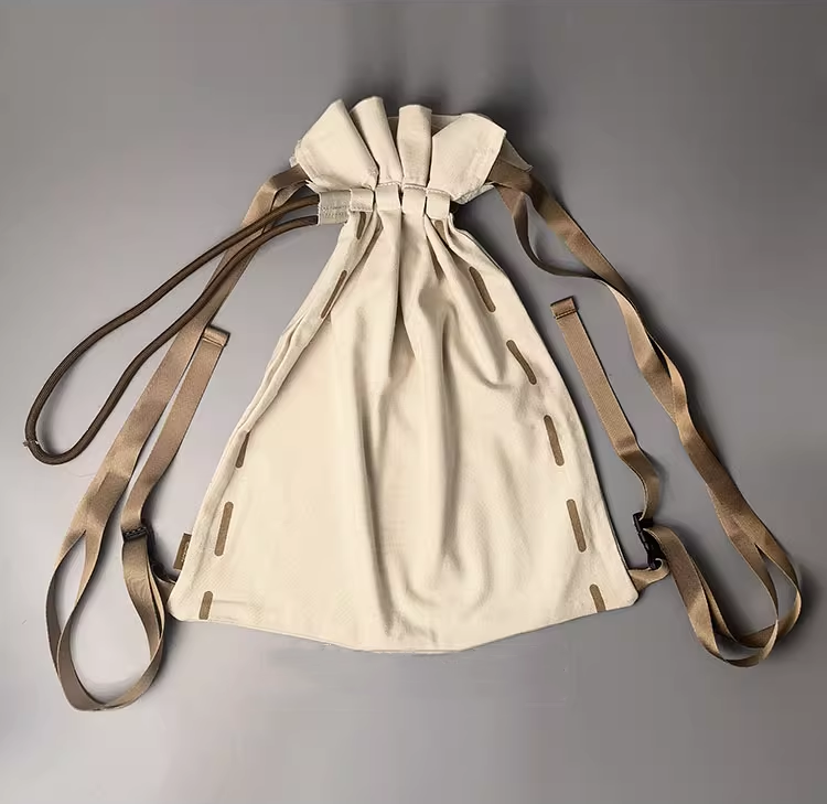 Artistic backpack featured in lifestyle flat lay