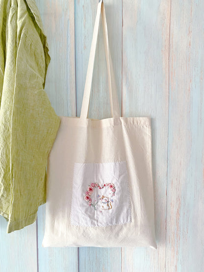 Hand embroidered tote for welcoming a new neighbor