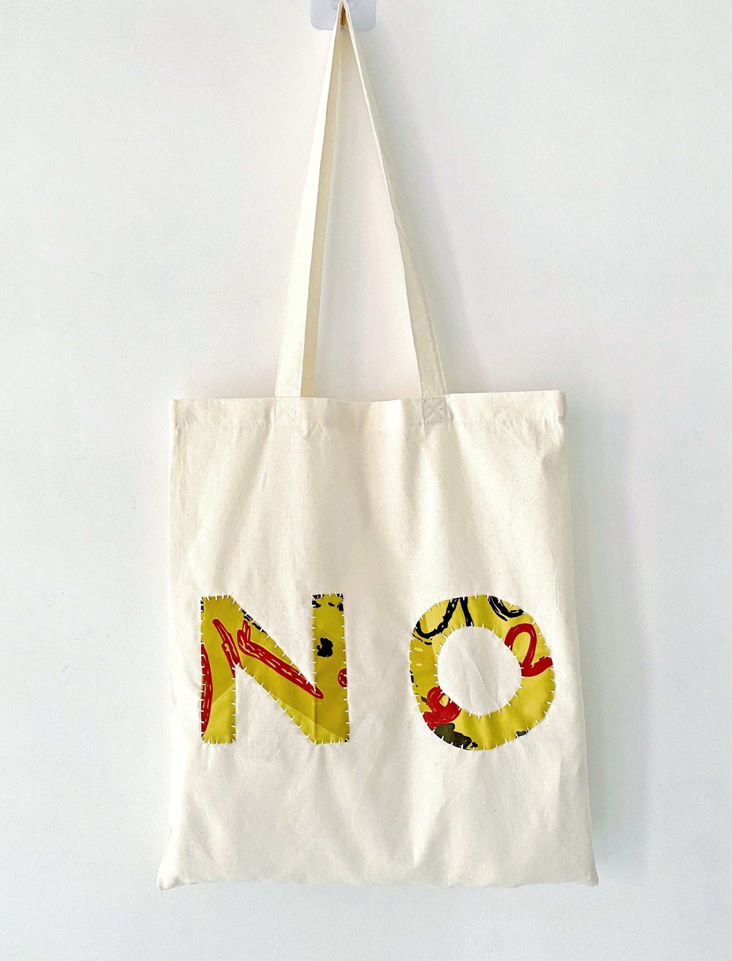 Genuine hand-stitched detail on a durable everyday bag.