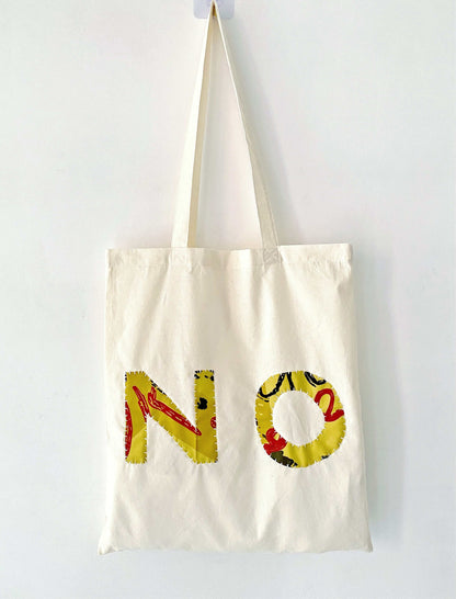 Genuine hand-stitched detail on a durable everyday bag.