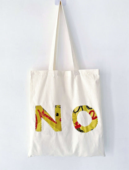 Vintage inspired collage design on an unstructured cotton pouch that becomes softer with every single wash