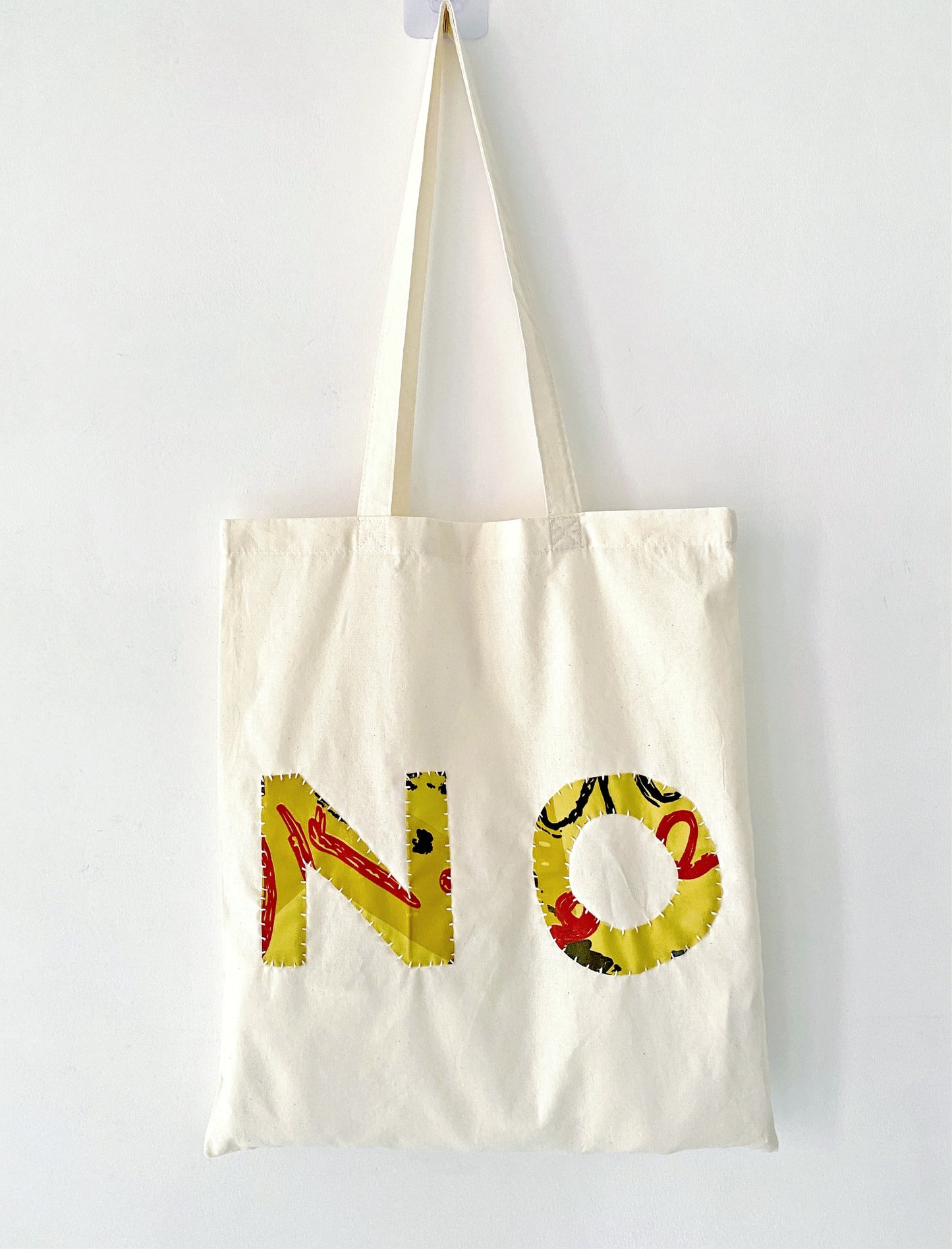 Genuine hand-stitched detail on a durable everyday bag.