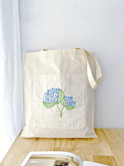 Unique gift idea: Beige tote with DIY-inspired embroidery