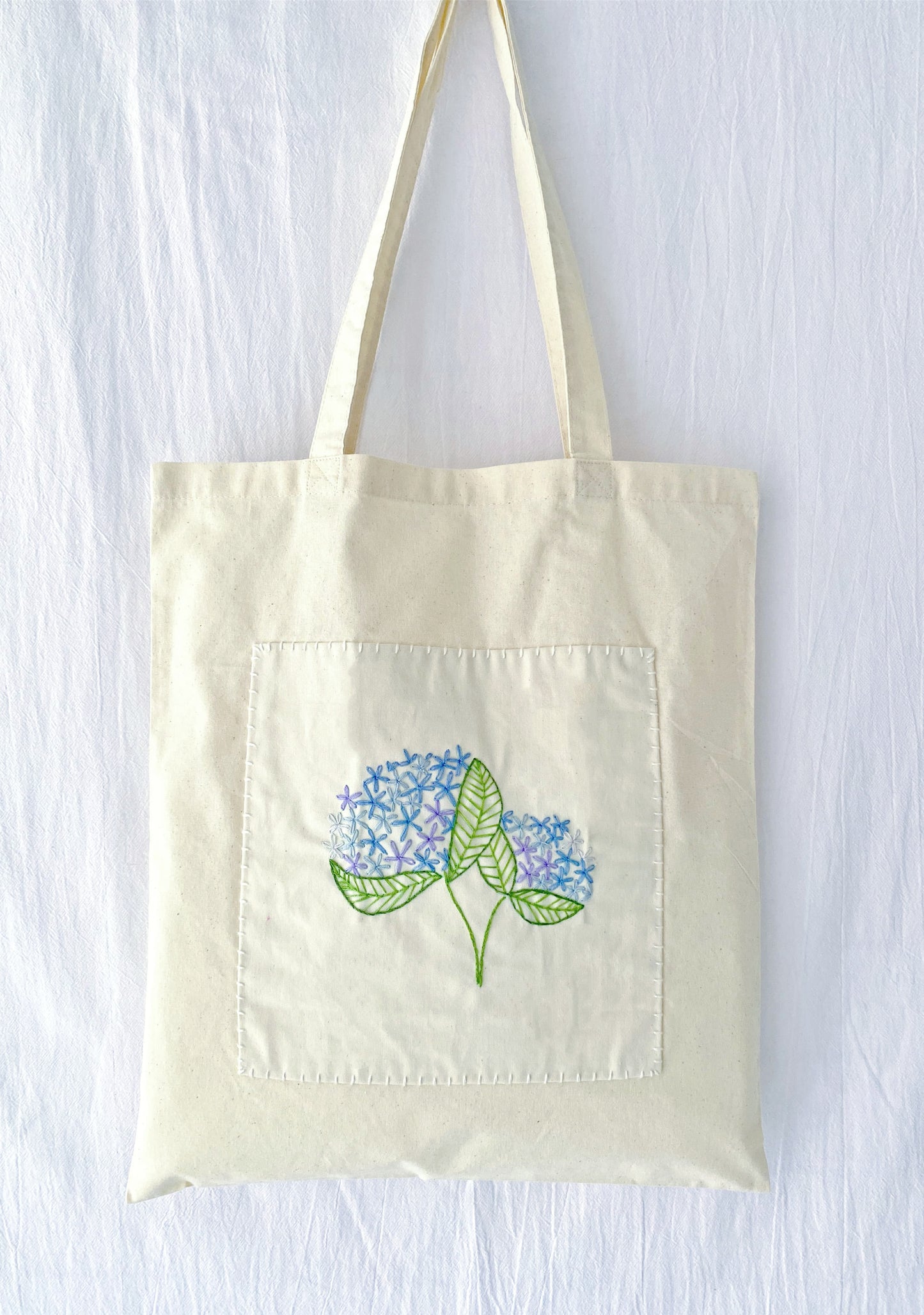Beige cotton tote with elegant handcraft floral needlework