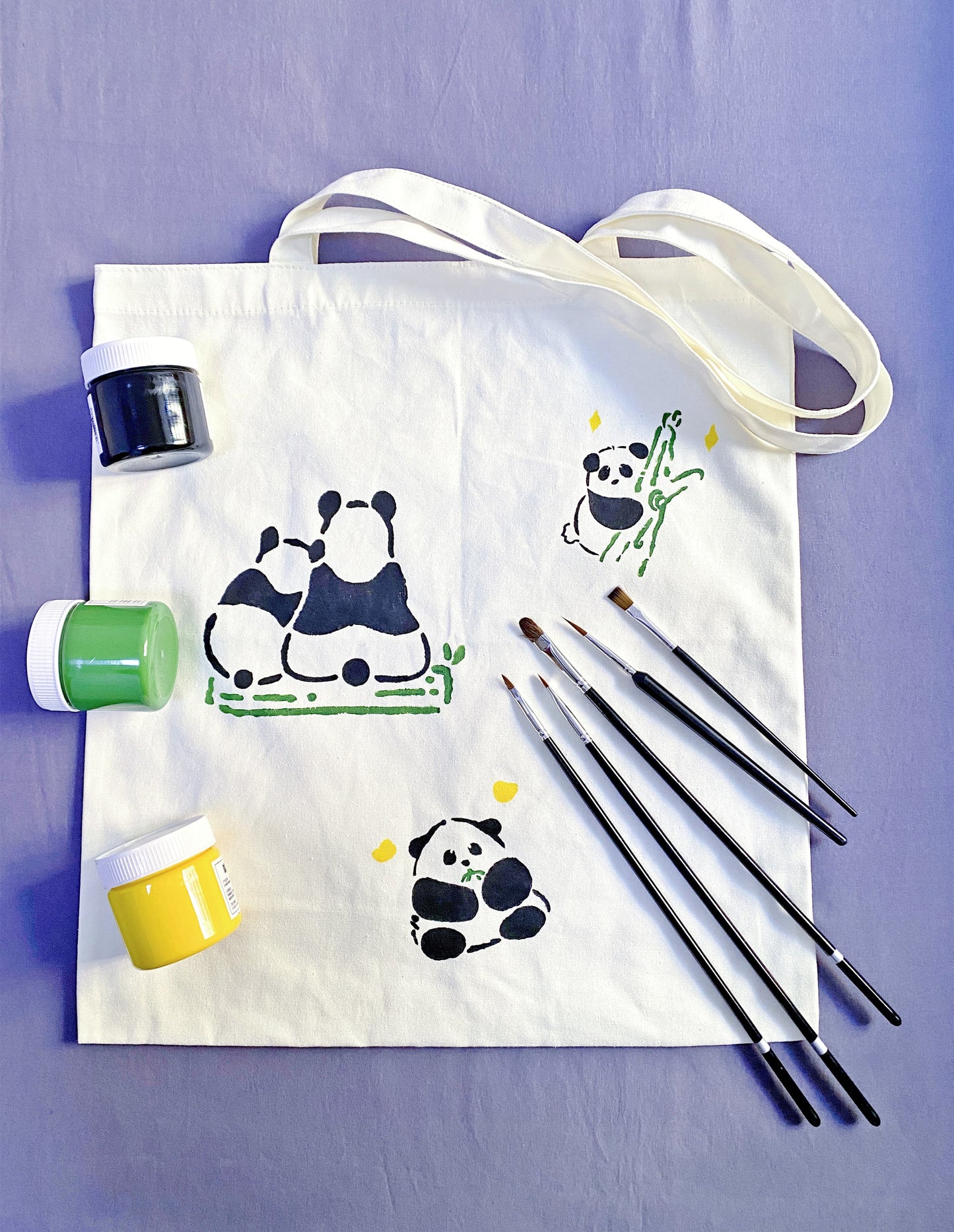 panda print canvas bag styled for casual outfits
