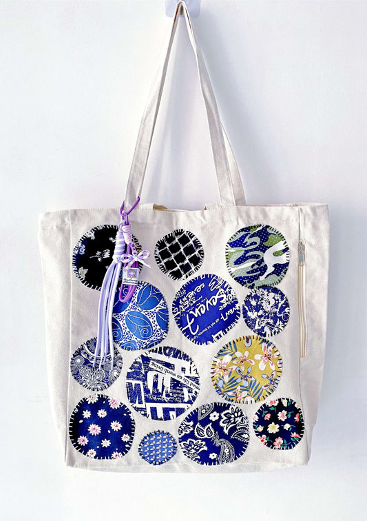 Functional oversized shopper designed for the conscious modern minimalist.