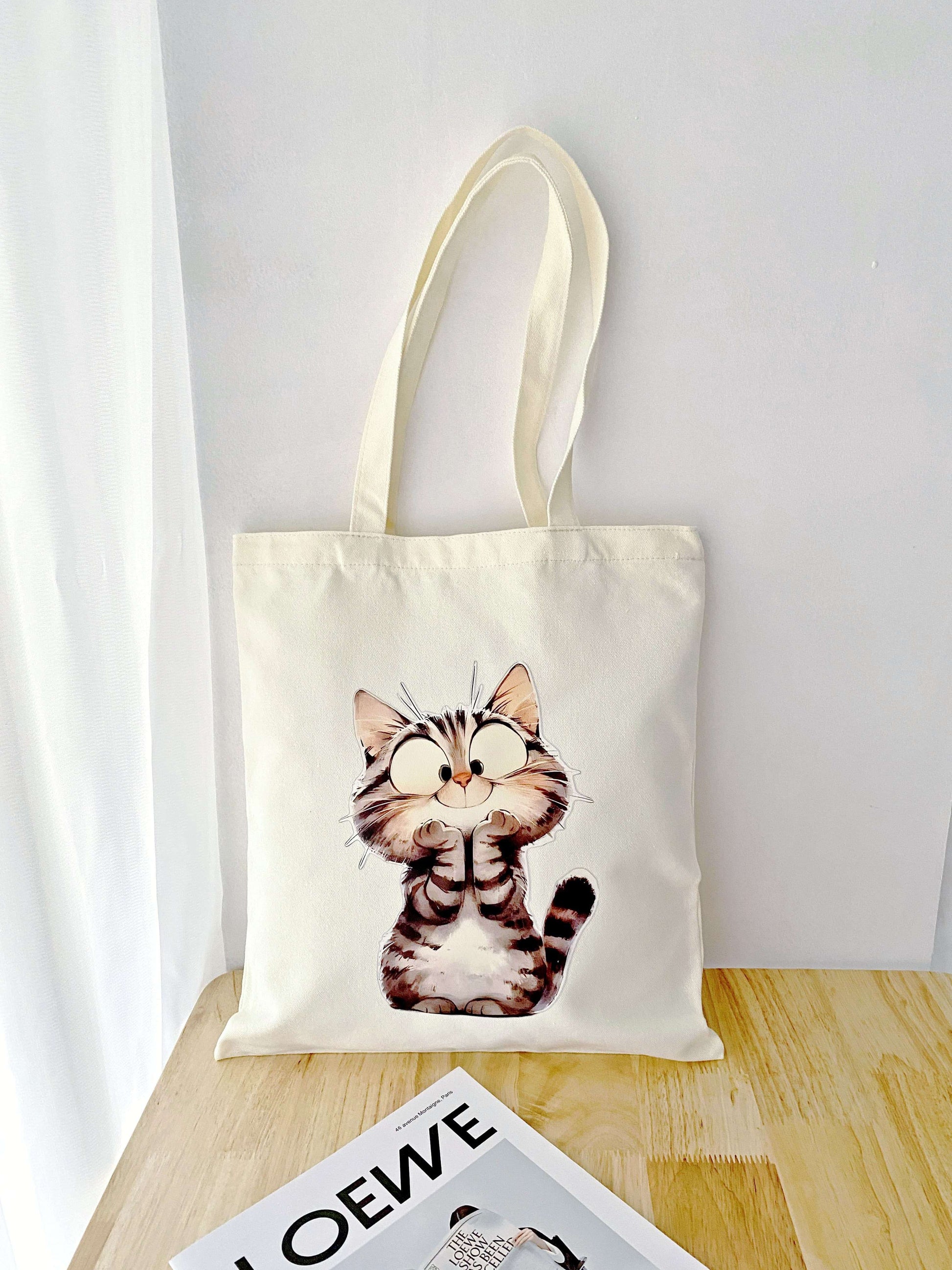 Natural material tote bag with charming kitty design