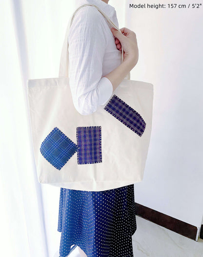 Durable, large capacity patchwork tote bags made from natural, sustainable cotton canvas. A perfect companion for your eco-conscious lifestyle.