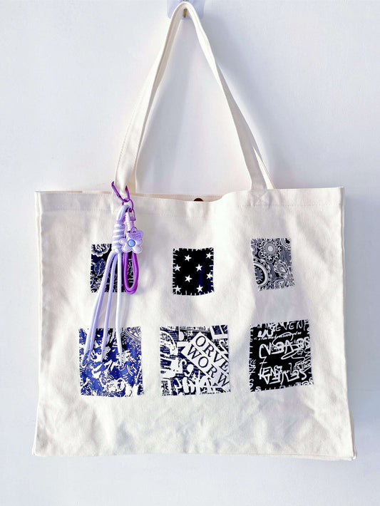 Textured natural canvas shopper showing unique hand-sewn details for a personal touch.