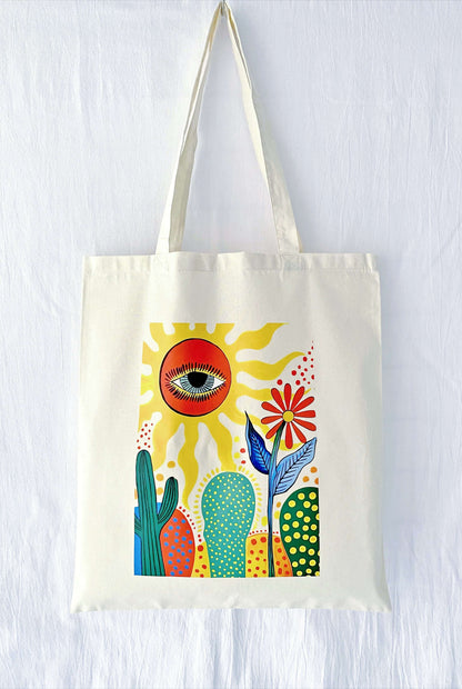 A stack of three different hand-printed totes, suggesting a thoughtful matching gift set for bridesmaids or a group of close sisters.