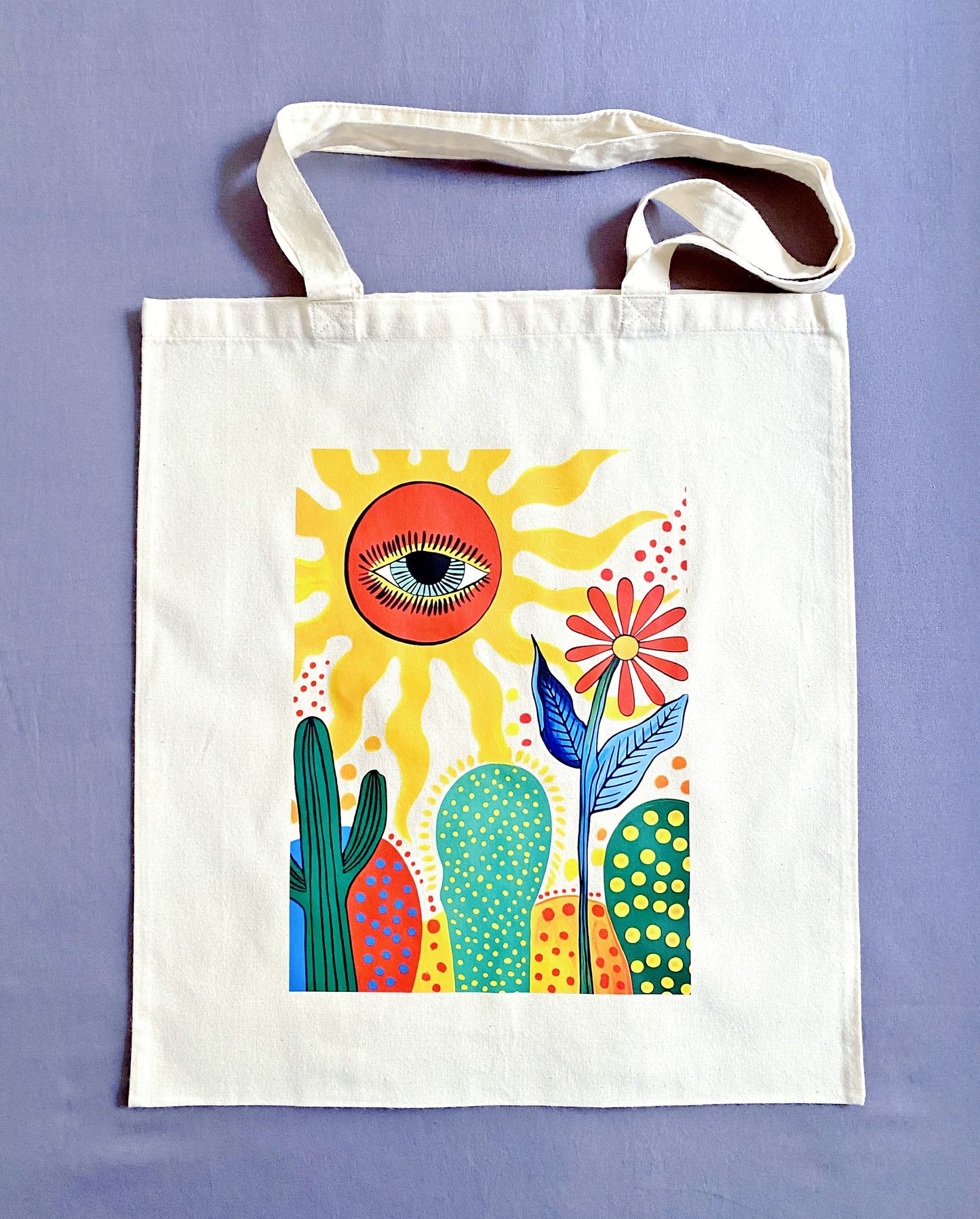 Minimalist aesthetic natural cotton shoulder bag with sun and cactus print.