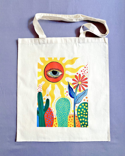 Minimalist aesthetic natural cotton shoulder bag with sun and cactus print.