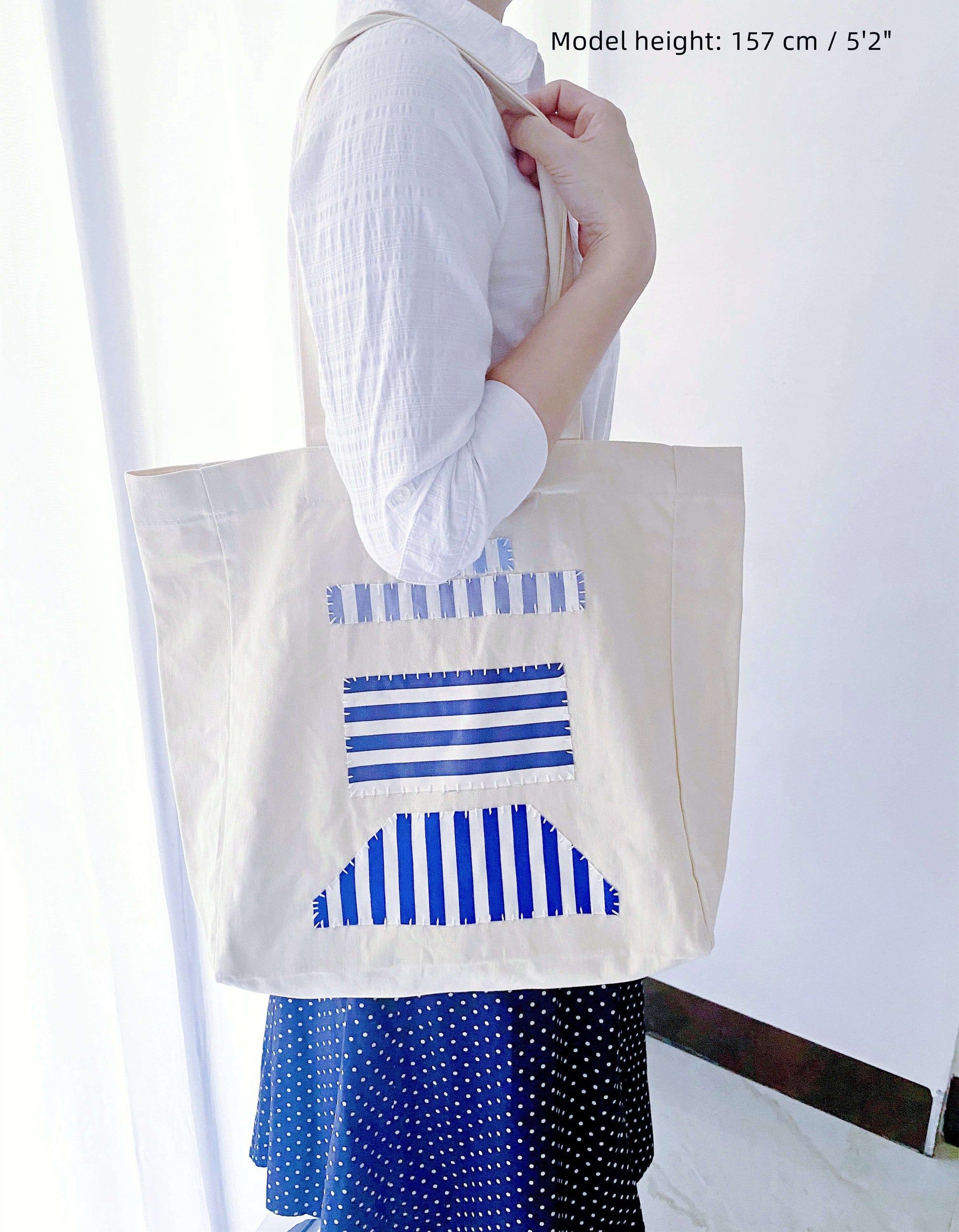 Durable sustainable tote with artisan stitching, a thoughtful birthday gift for sisters.