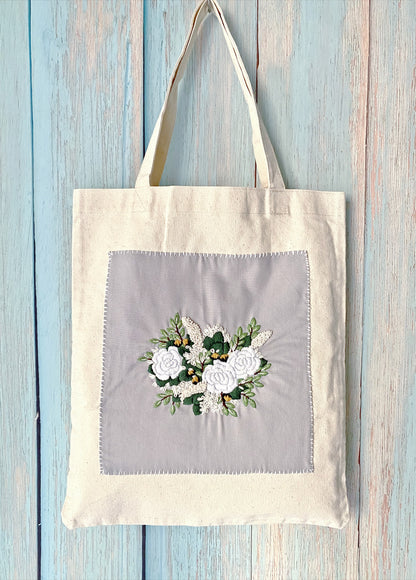 creative floral embroidery on an eco canvas tote bag