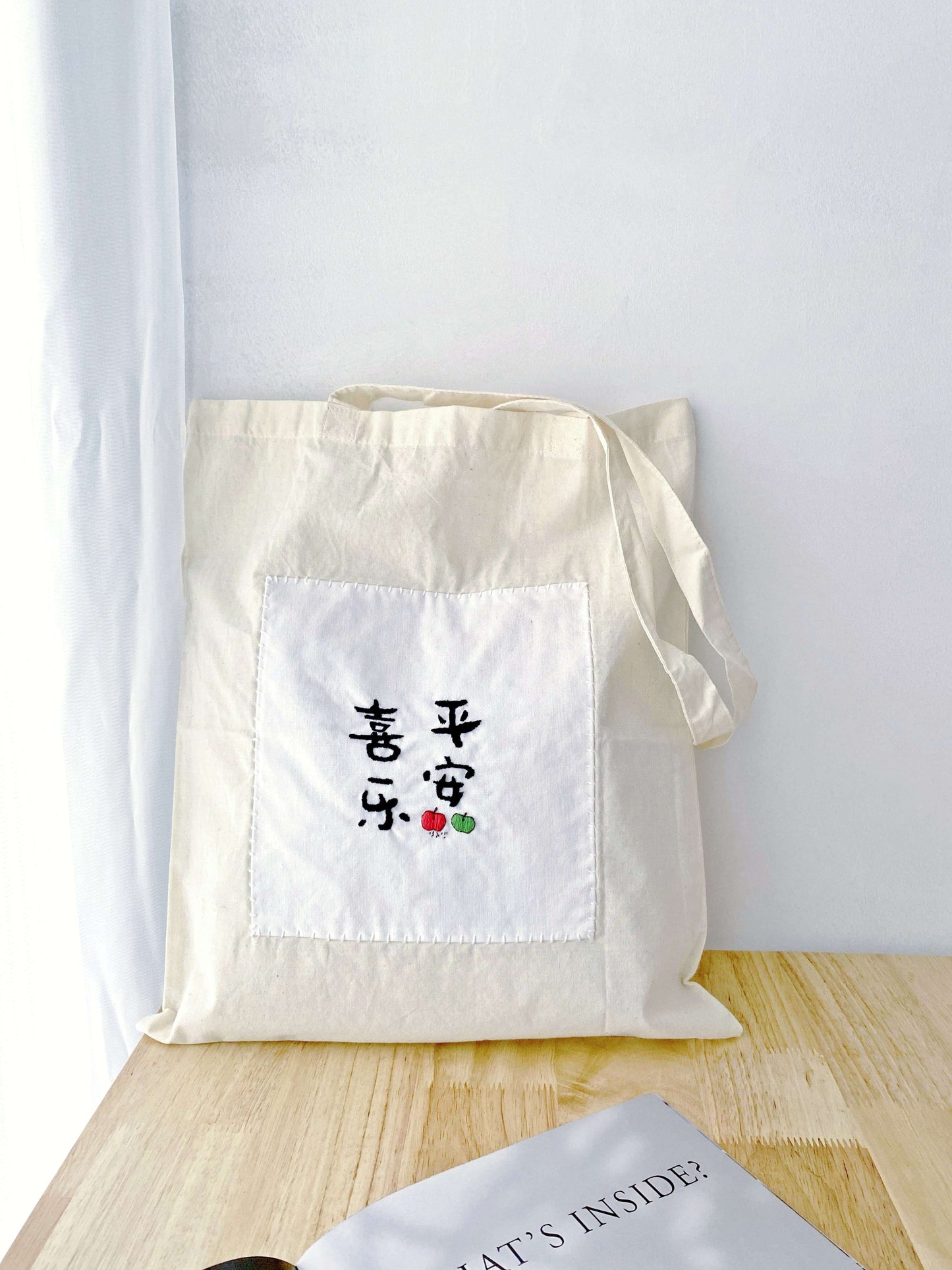 Essentials for slow living packed in a roomy soft tote, accented with a Zen-inspired hand-embroidered Chinese font.