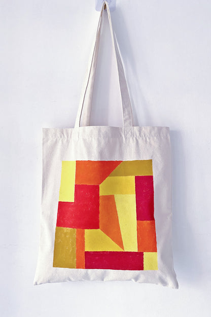 Comparison of the large bag size against a standard 16-inch laptop.