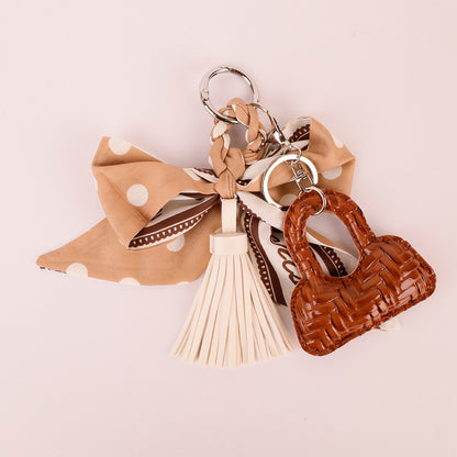 Handmade bow tassel hanger for everyday handbags