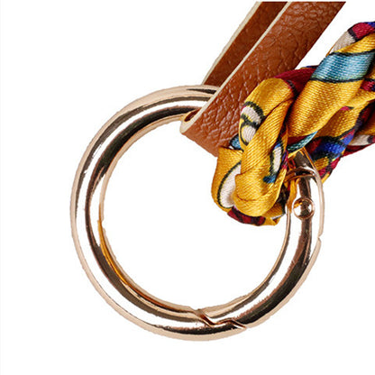 Flowing tassel detail adding character to a shoulder bag