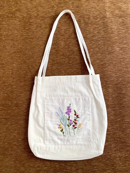Handmade embroidered floral shoulder bag chosen for a friend who loves slow living style