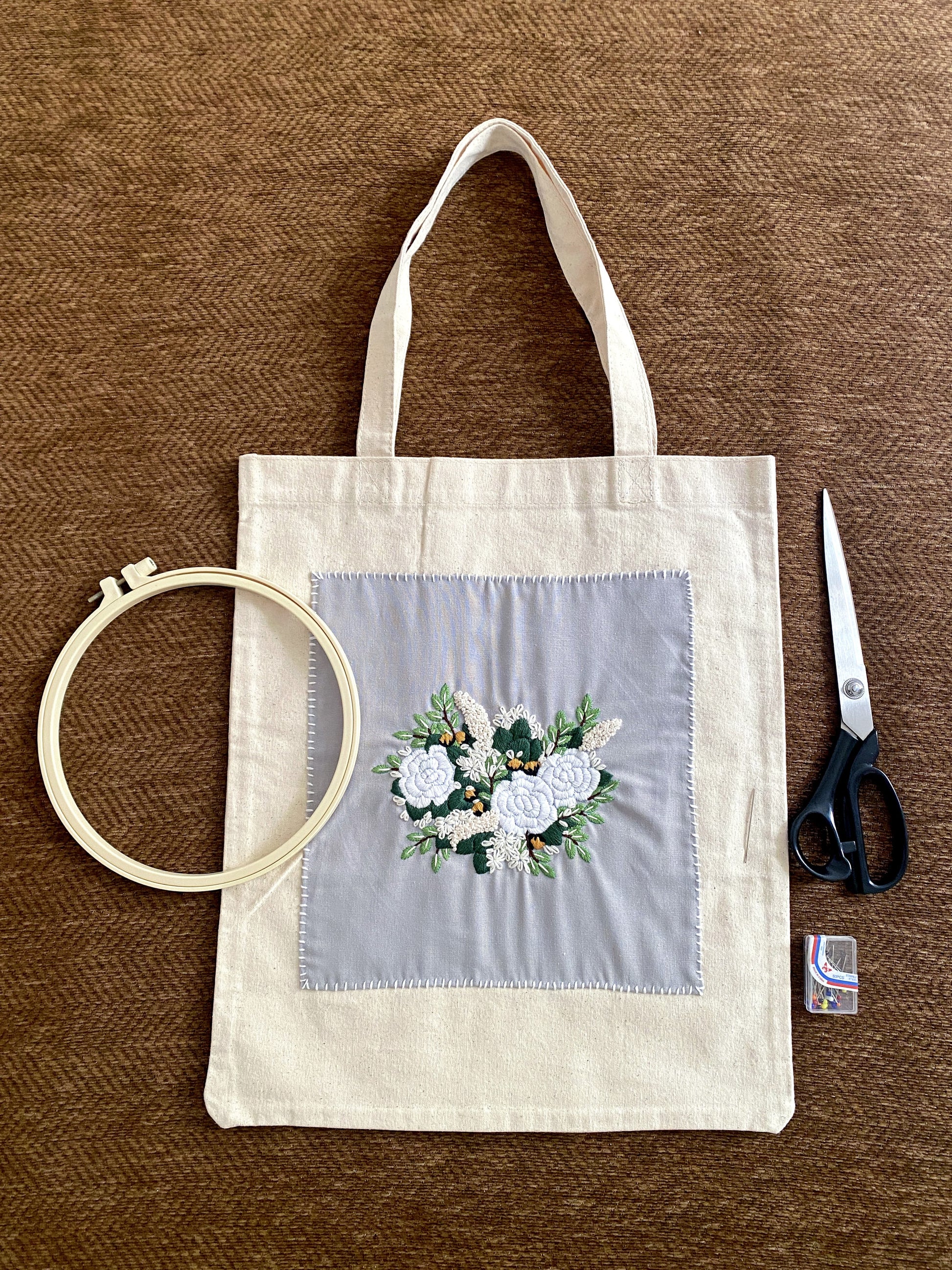 Hand embroidered floral tote bag for a creative artist gift idea