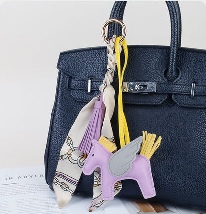 Elegant leather horse keychain attachment for luxury purses and daily everyday carry bags