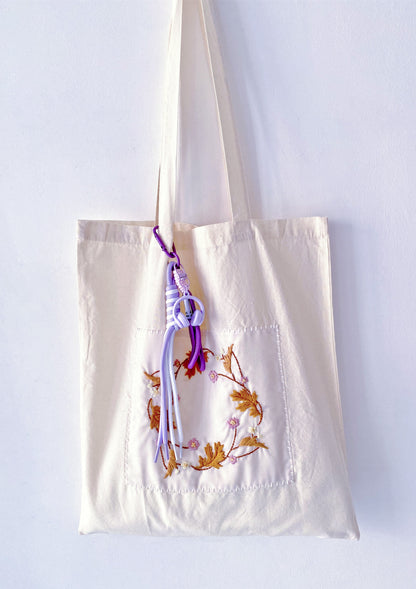 Soft touch organic cotton tote with delicate hand needlework